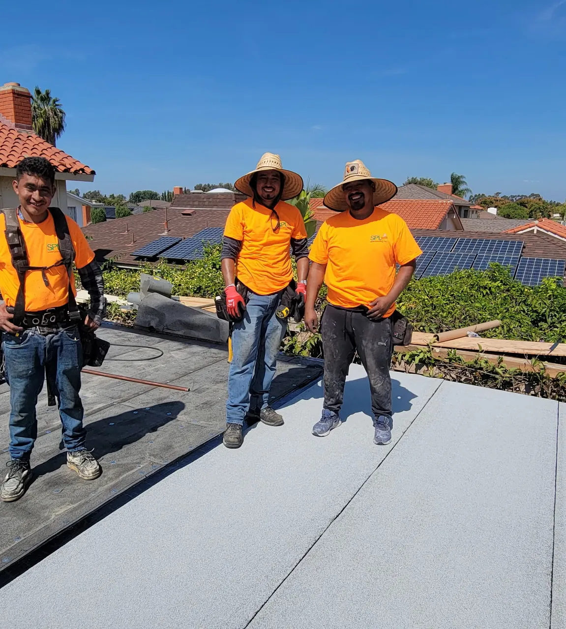 Licensed waterproofing professionals inspecting a commercial structure in Southern California